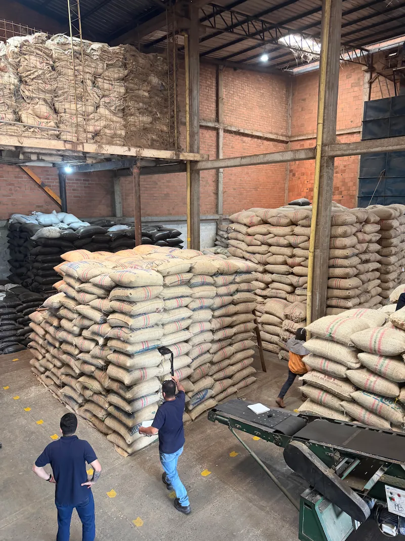 Our team at the warehouse inspecting coffee bags